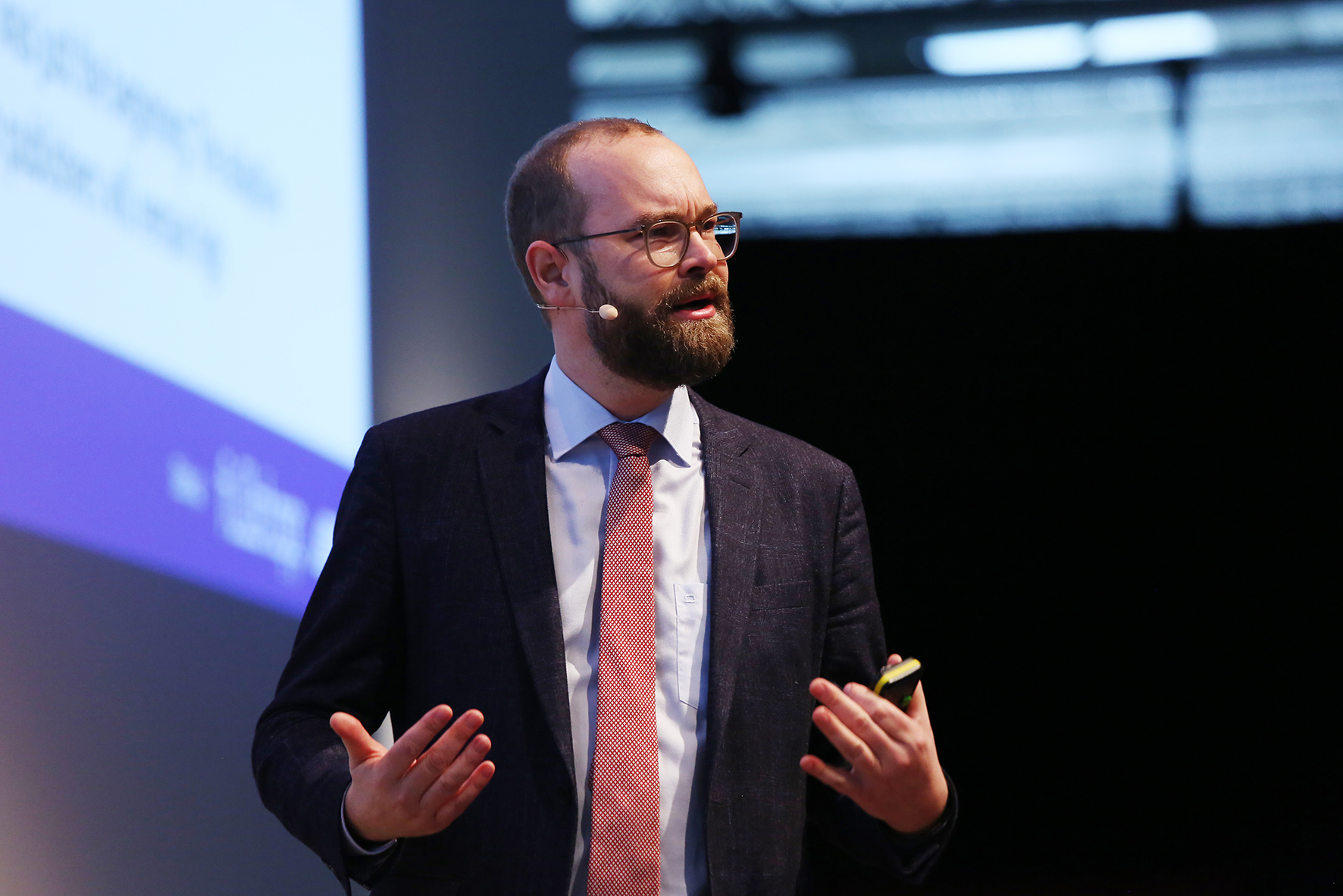 Sven Fund speaking on stage